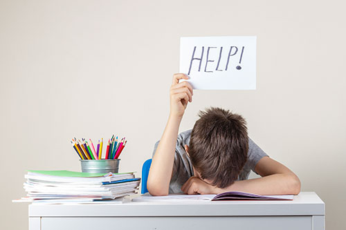 student with help sign