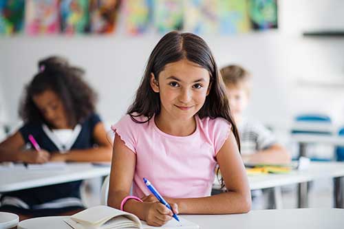 girl sitting at desk